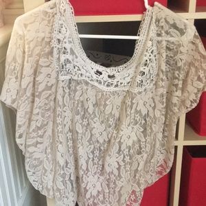 White and beige lace sheer top.